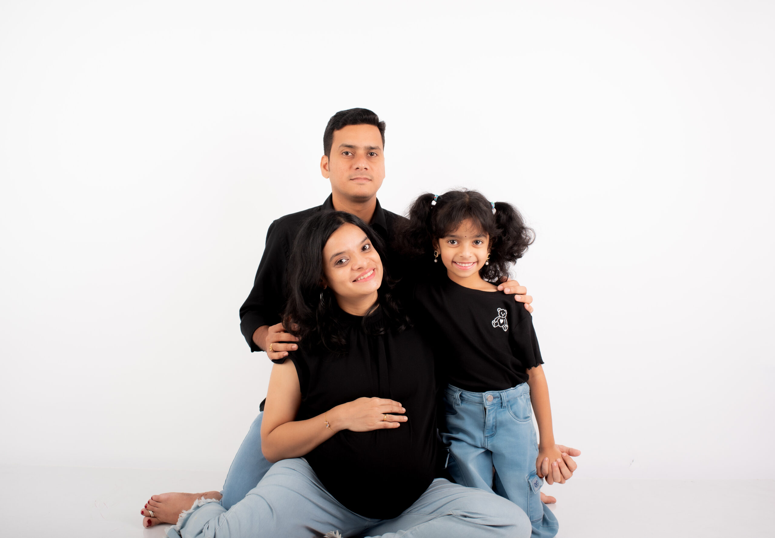 The Ammazing Life family — Sreepradhaa, her husband, and Dhruthi